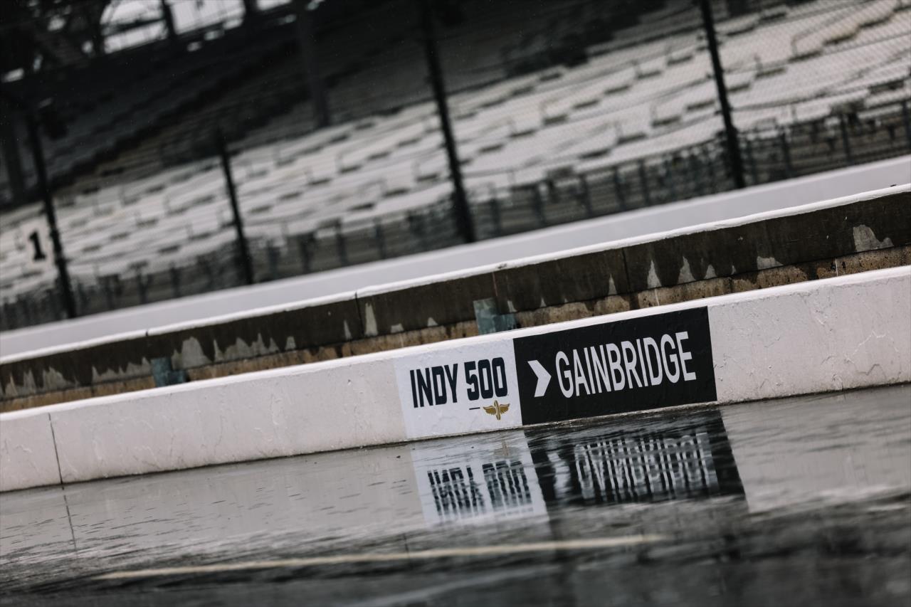 A wet pit lane - Indianapolis 500 Practice - By: Joe Skibinski -- Photo by: Joe Skibinski