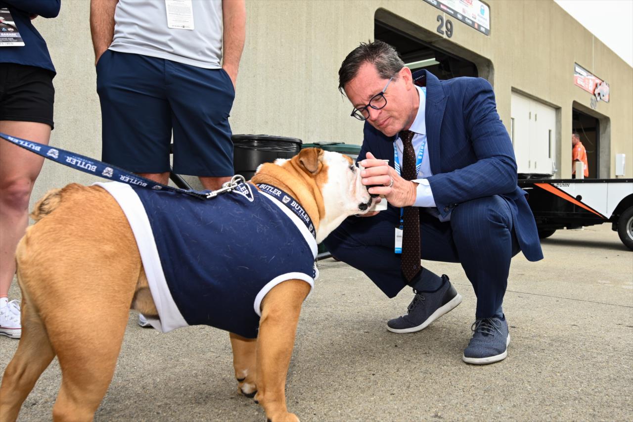 Doug Boles with Butler's mascot Blue - Indianapolis 500 Practice - By: James Black -- Photo by: James  Black