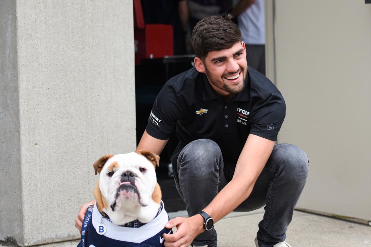Butler's mascot Blue with Rinus VeeKay - Indianapolis 500 Practice - By: James Black -- Photo by: James  Black