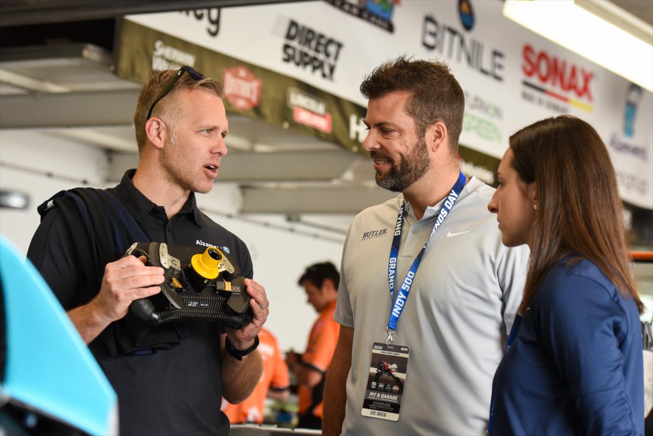 Ed Carpenter with Butler Women's Head Basketball Coach Austin Parkinson and Assistant Coach Holly Hoopingarner - Indianapolis 500 Practice - By: James Black -- Photo by: James  Black