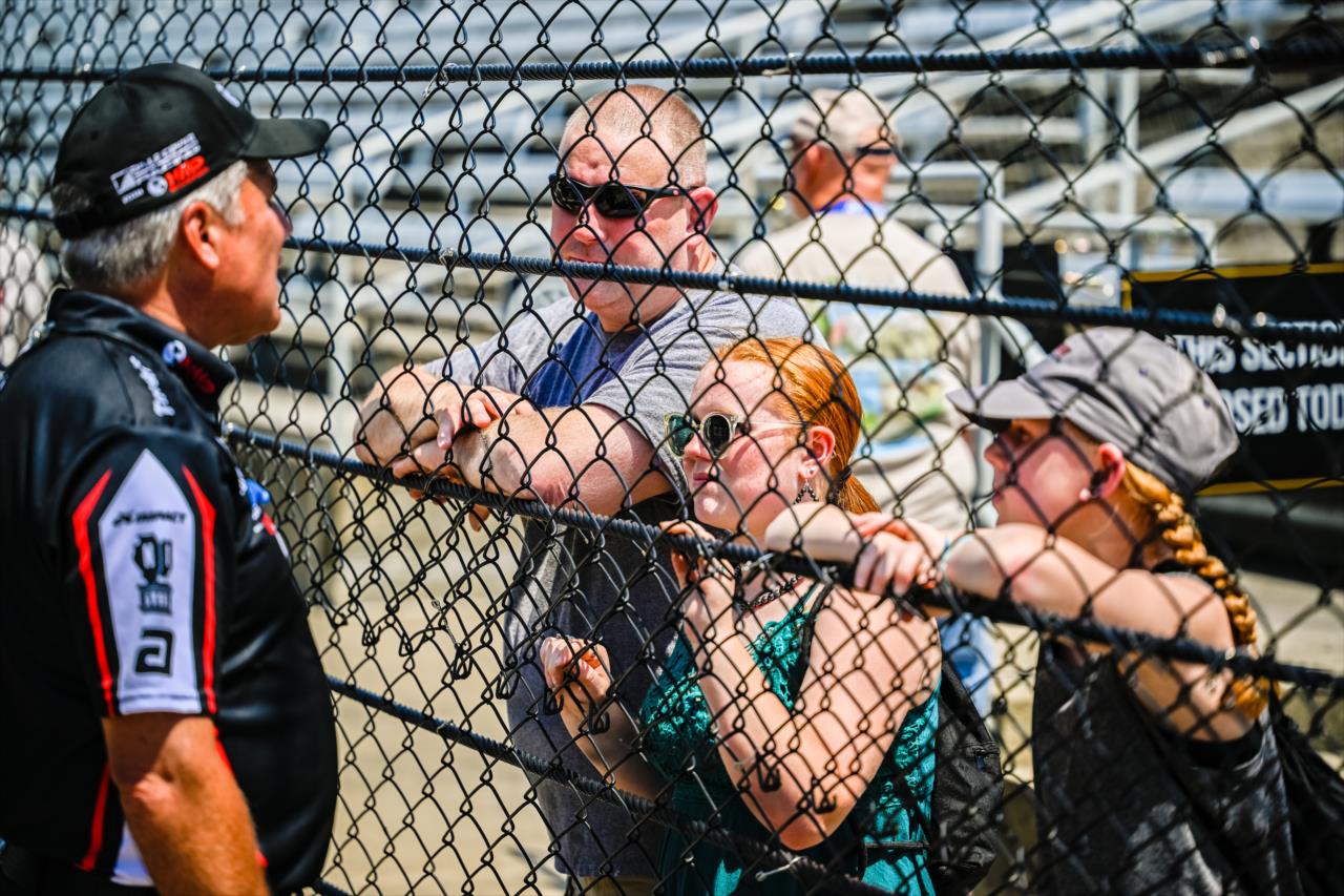 Race fans at the Pit fence - Indianapolis 500 Practice - By: Karl Zemlin -- Photo by: Karl Zemlin