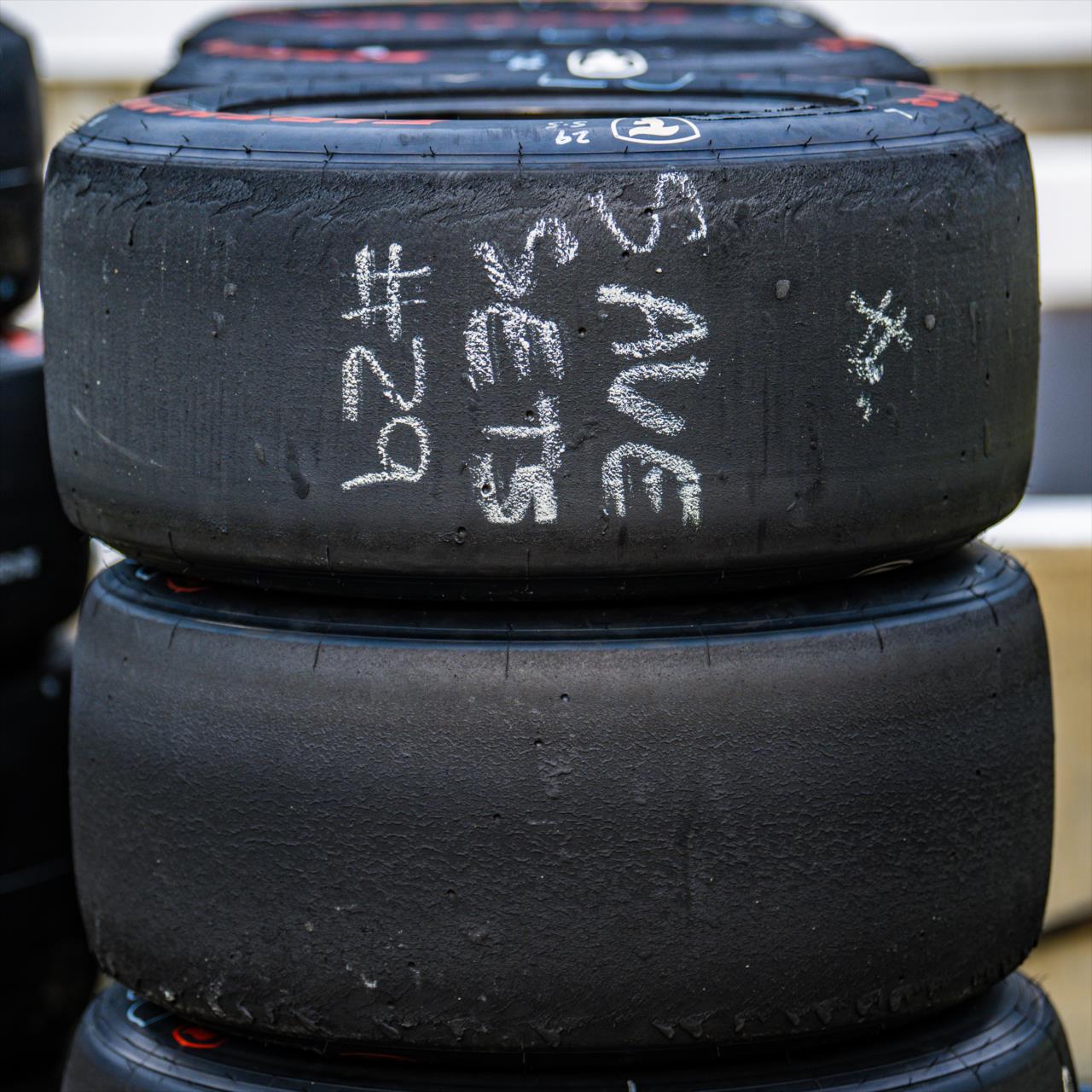 Scrub Firestone Tires in the Devlin DeFrancesco pit - PPG Presents Armed Forces Qualifying - By: Karl Zemlin -- Photo by: Karl Zemlin
