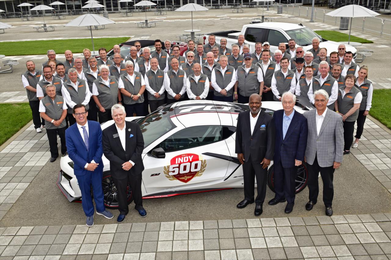 Doug Boles, Roger Penske and Roger Penske in front of a Chevrolet Pace Car following the Mayor's Breakfast - PPG Presents Armed Forces Qualifying - By: Walt Kuhn -- Photo by: Walt Kuhn