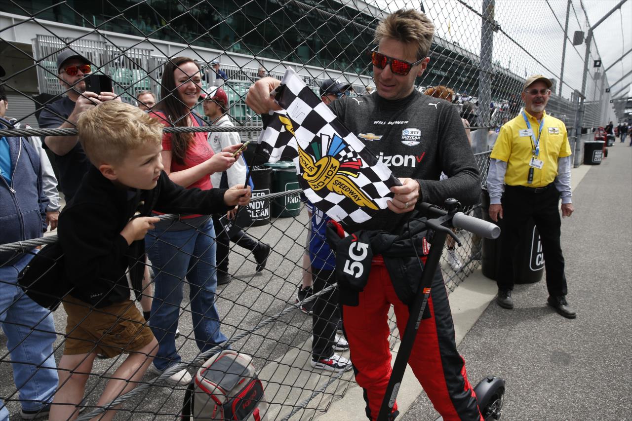 Will Power with a fan - PPG Presents Armed Forces Qualifying - By: Chris Jones -- Photo by: Chris Jones