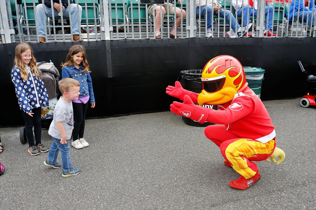Firestone Firehawk with young fans - PPG Presents Armed Forces Qualifying - By: Paul Hurley -- Photo by: Paul Hurley