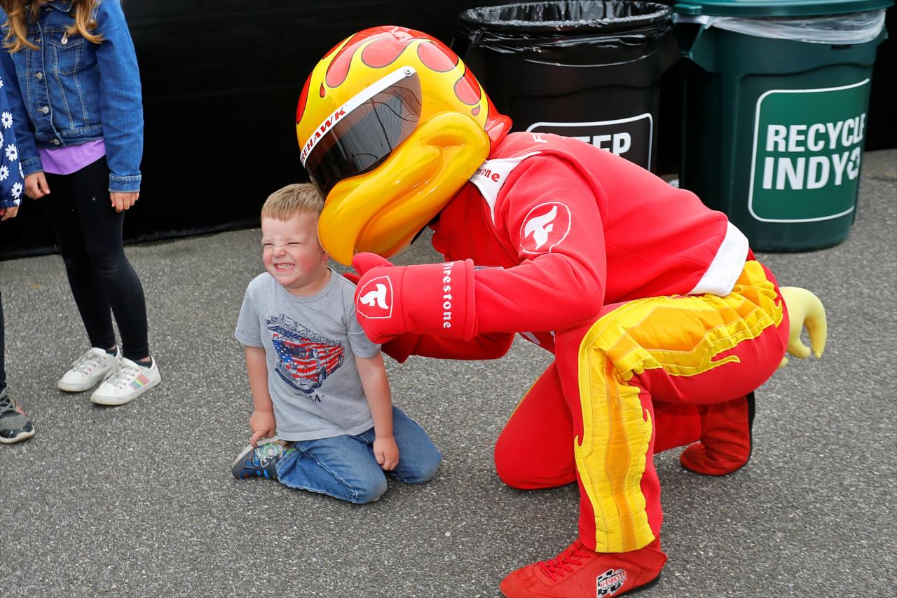Firestone Firehawk with a young fan - PPG Presents Armed Forces Qualifying - By: Paul Hurley -- Photo by: Paul Hurley