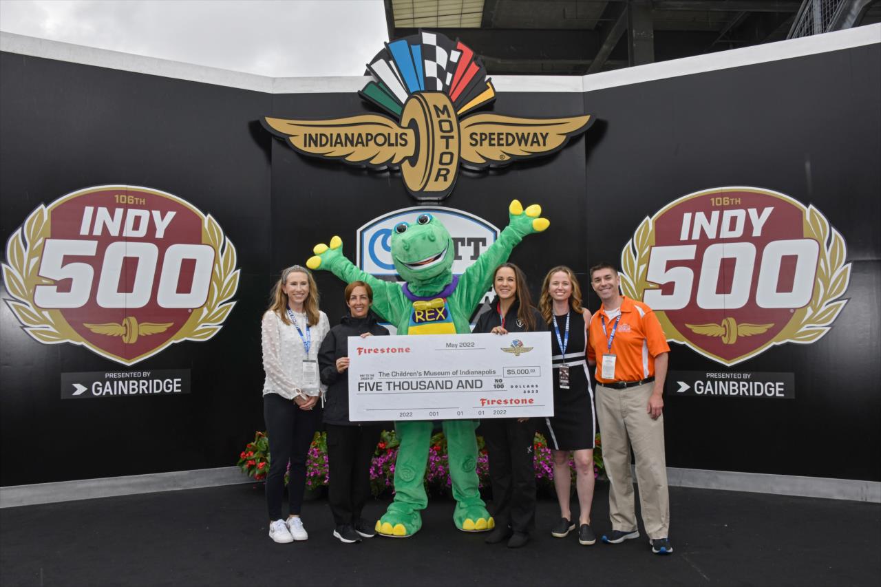 Firestone donation to The Children's Museum of Indianapolis - Miller Light Carb Day - By: John Cote -- Photo by: John Cote