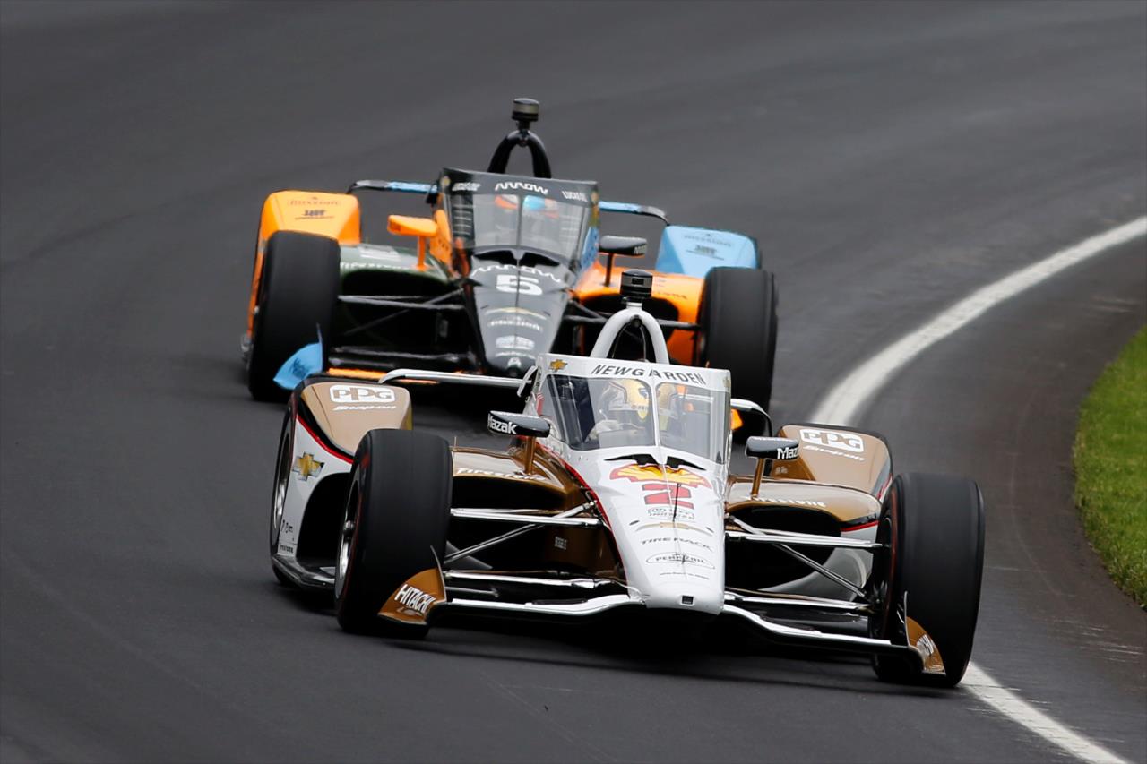 Josef Newgarden leads Pato O'Ward - Miller Light Carb Day - By: Paul Hurley -- Photo by: Paul Hurley
