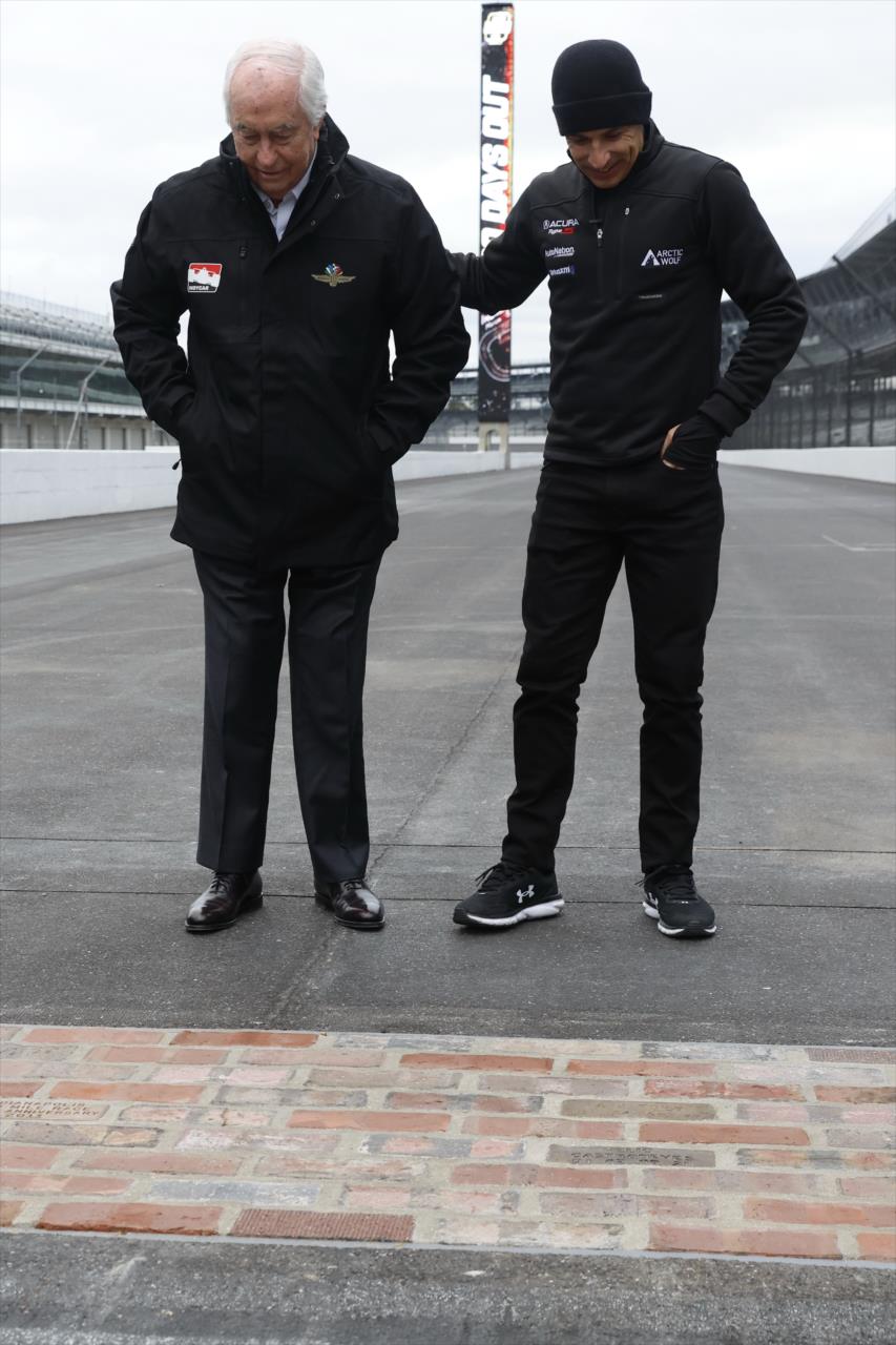 Roger Penske and Helio Castroneves at unveiling of Helio's 4 Time Winner Brick at Yard of Bricks - By: Chris Jones -- Photo by: Chris Jones