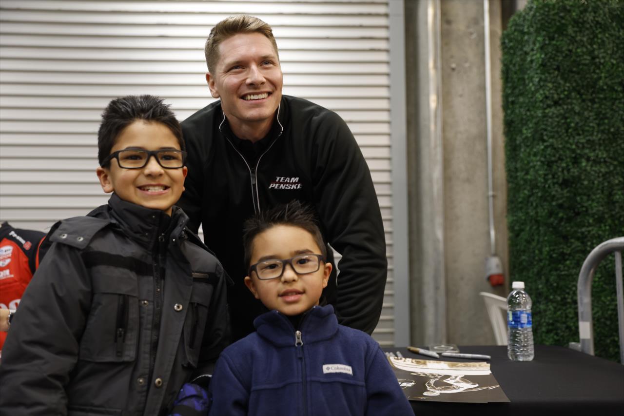 Josef Newgarden and fans at Indy 500 - 100 Days Out Fan Party - By: Chris Jones -- Photo by: Chris Jones