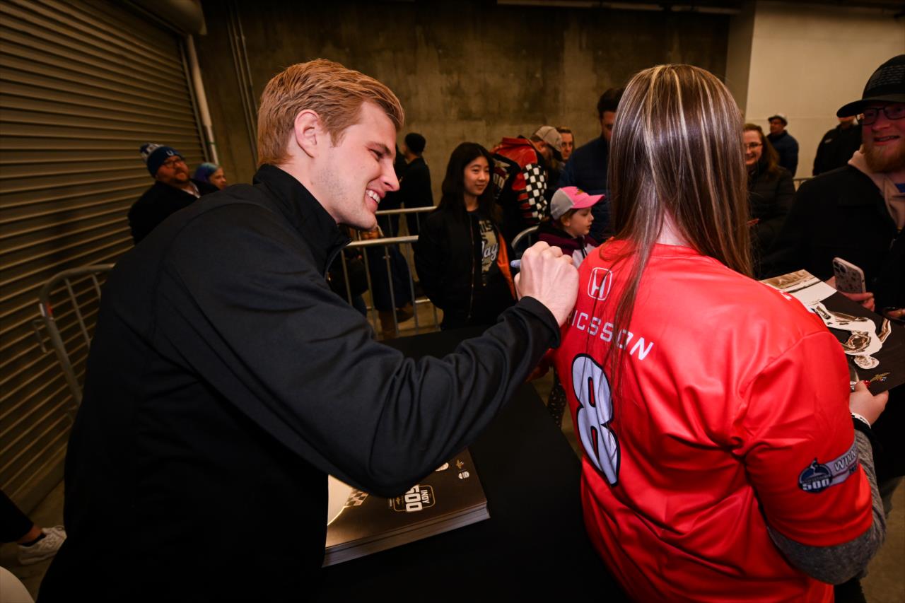Marcus Ericsson and fan at Indy 500 - 100 Days Out Fan Party - By: James Black -- Photo by: James  Black