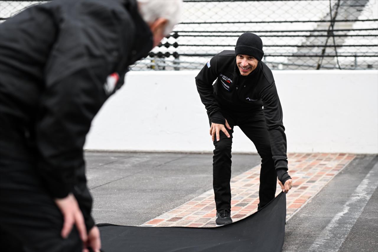Roger Penske and Helio Castroneves unveil Helio's 4 Time Winner Brick at Yard of Bricks - By: James Black -- Photo by: James  Black