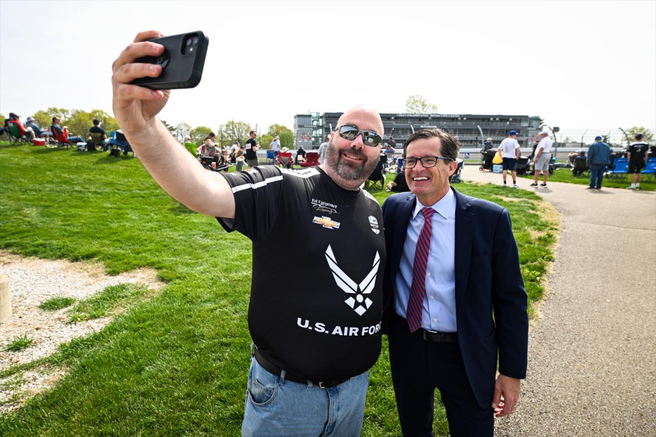 IMS Track President Doug Boles poses for a picture with a fan. - Indianapolis 500 Open Test - By: James Black -- Photo by: James  Black