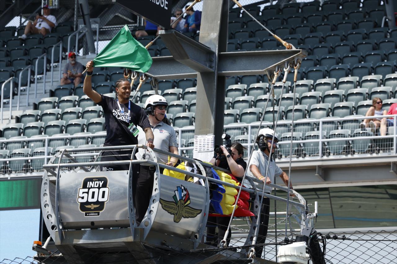 Indianapolis Colts Rookie JuJu Brents waives the green flag - Indianapolis 500 Practice - By: Chris Jones -- Photo by: Chris Jones