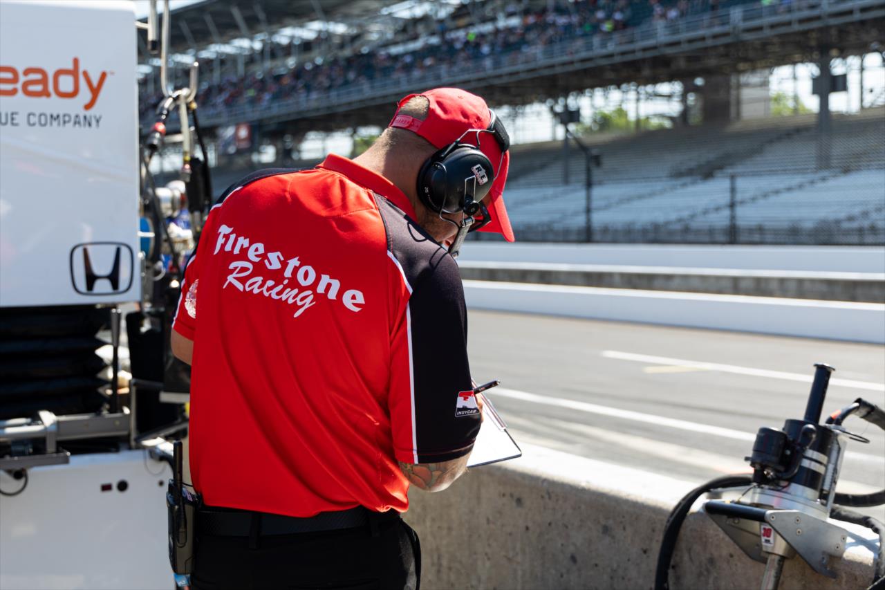 Firestone crew member - PPG Presents Armed Forces Qualifying - By: Travis Hinkle -- Photo by: Travis Hinkle