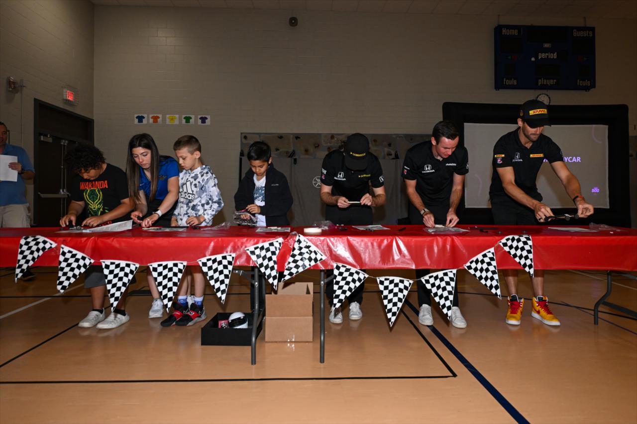 Romain Grosjean, Kyle Kirkwood and Colton Herta - Indianapolis 500 Community Day - By: James Black -- Photo by: James  Black