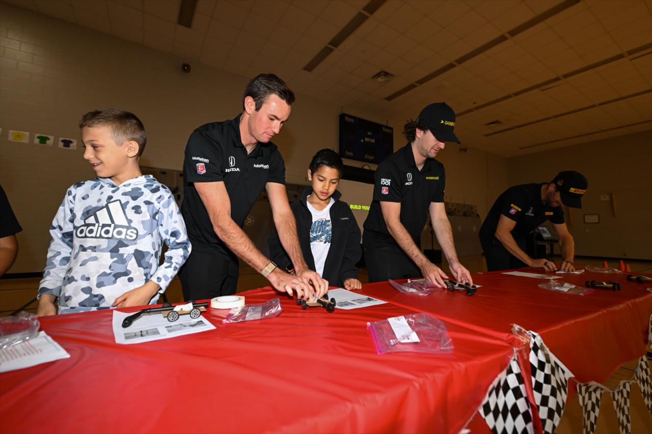 Romain Grosjean, Kyle Kirkwood and Colton Herta - Indianapolis 500 Community Day - By: James Black -- Photo by: James  Black