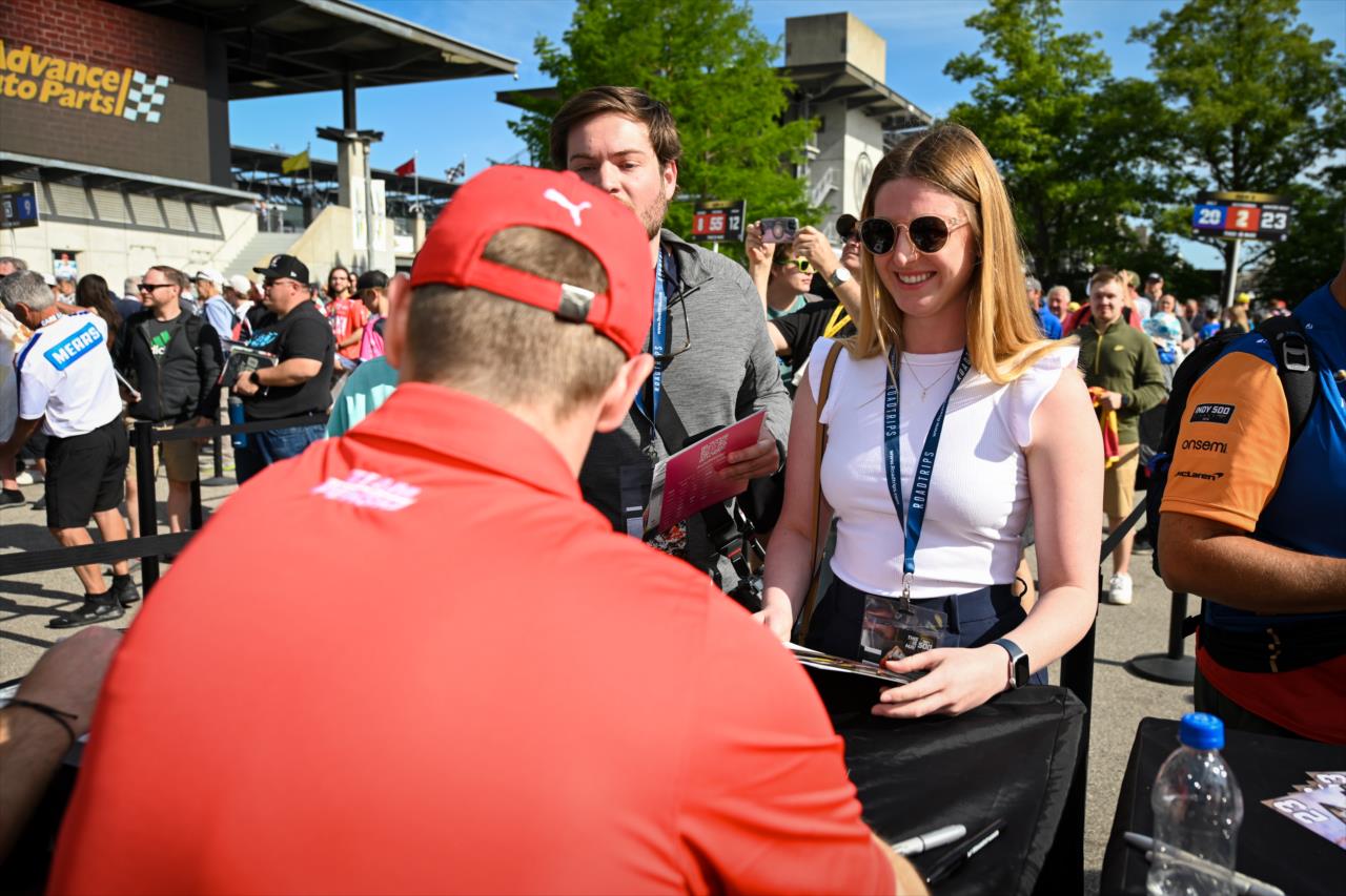 Josef Newgarden signs an autograph - Legends Day by Firestone Autograph Session - By: James Black -- Photo by: James  Black