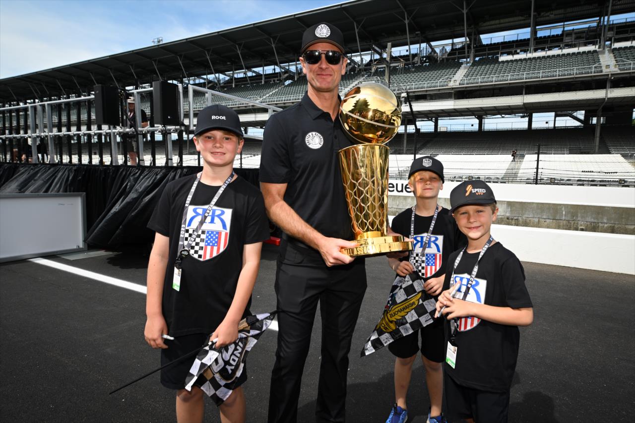 Ryan Hunter-Reay and sons with the Larry O'Brien Championship Trophy - Legends Day by Firestone - By: James Black -- Photo by: James  Black