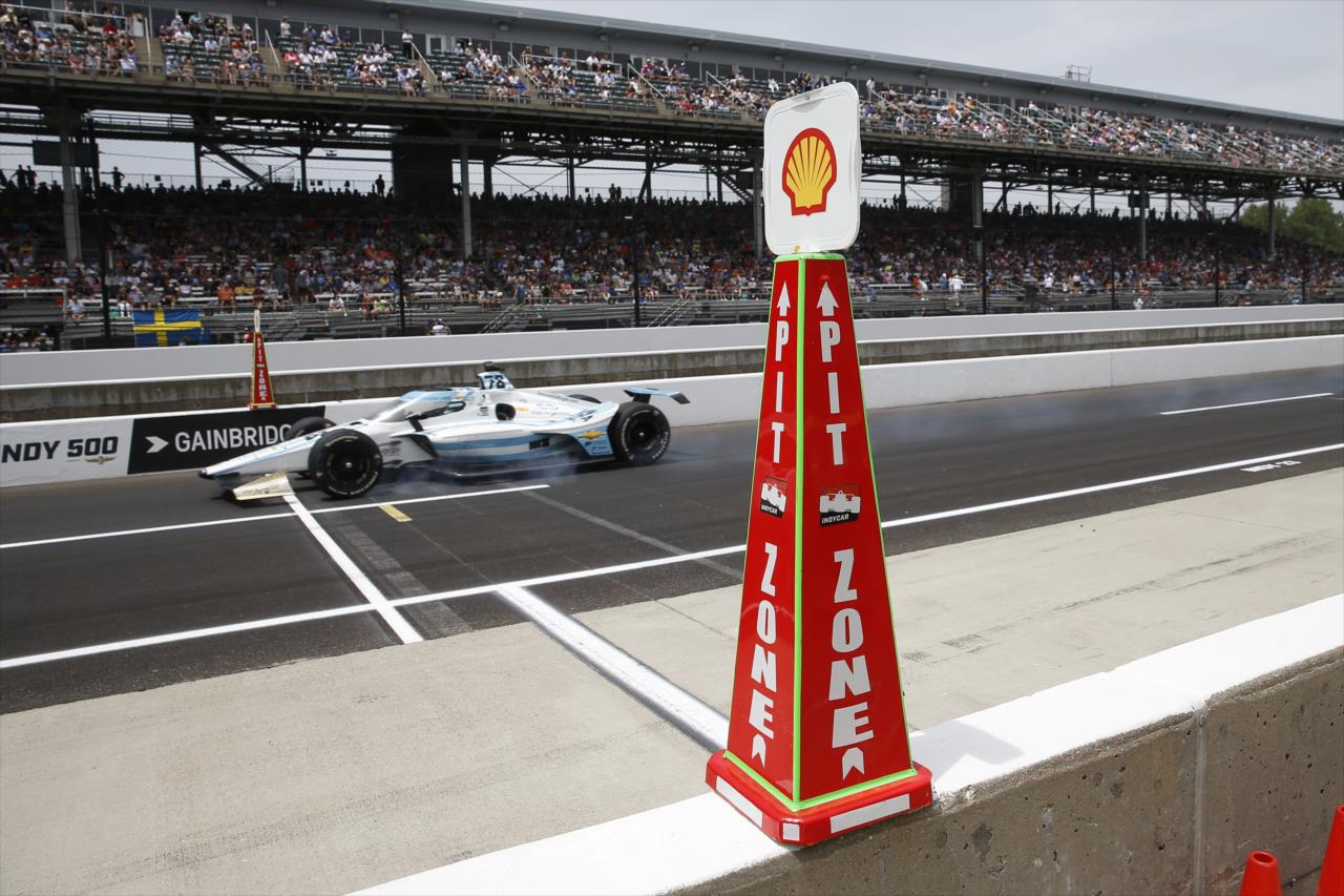 Agustin Canapino enters pit lane - 107th Running of the Indianapolis 500 Presented By Gainbridge - By: Chris Jones -- Photo by: Chris Jones