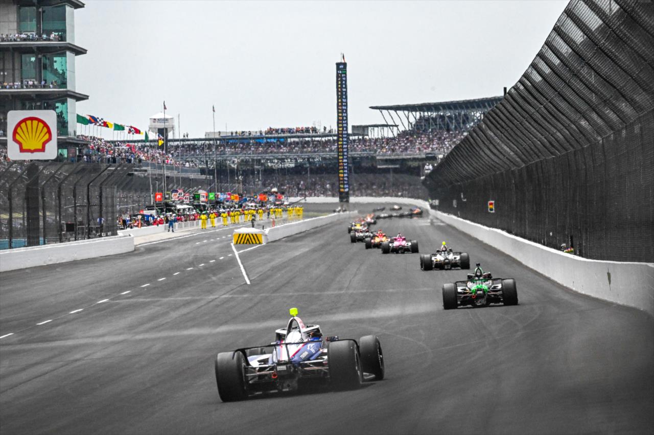 Sailing onto the frontstretch - 107th Running of the Indianapolis 500 Presented By Gainbridge - By: Doug Mathews -- Photo by: Doug Mathews