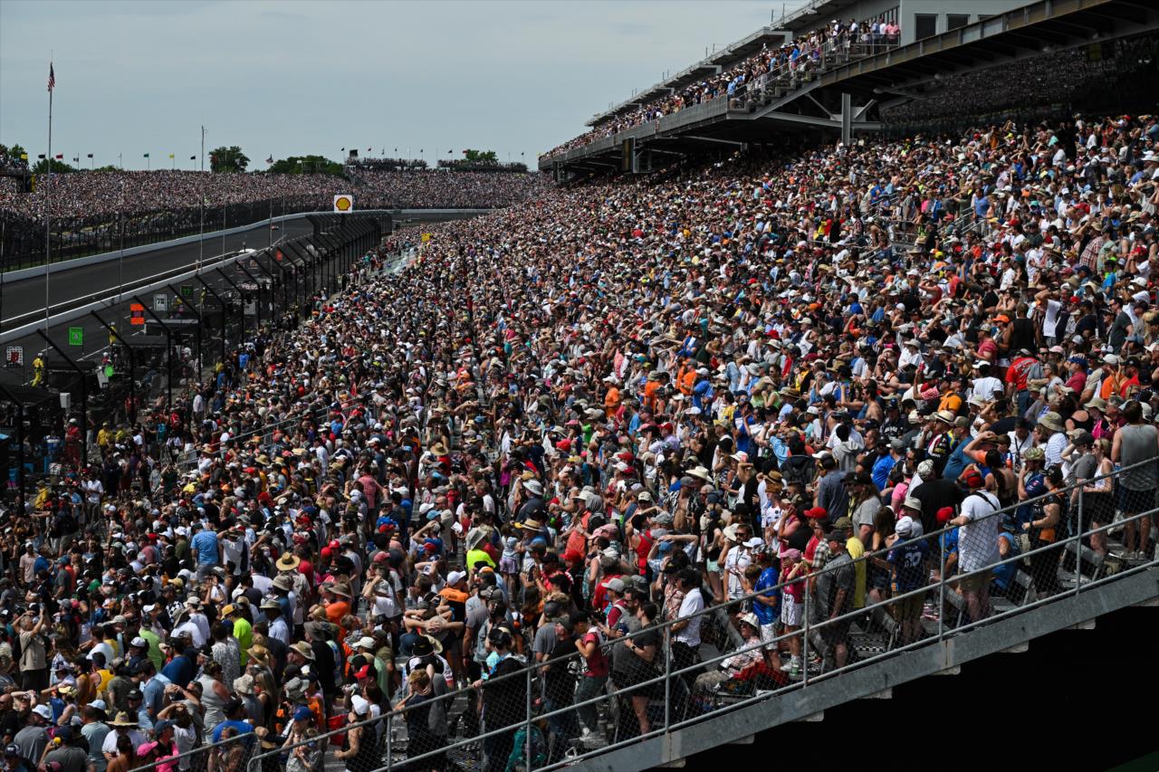 Fans along the frontstretch - 107th Running of the Indianapolis 500 Presented By Gainbridge - By: James Black -- Photo by: James  Black