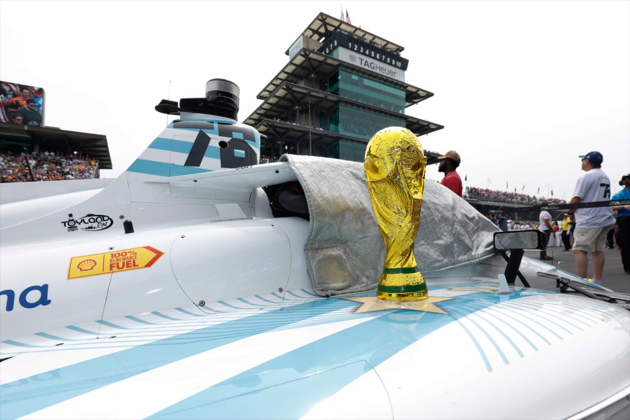 The World Cup trophy on the machine of Agustin Canapino - 107th Running of the Indianapolis 500 Presented By Gainbridge - By: Joe Skibinski -- Photo by: Joe Skibinski