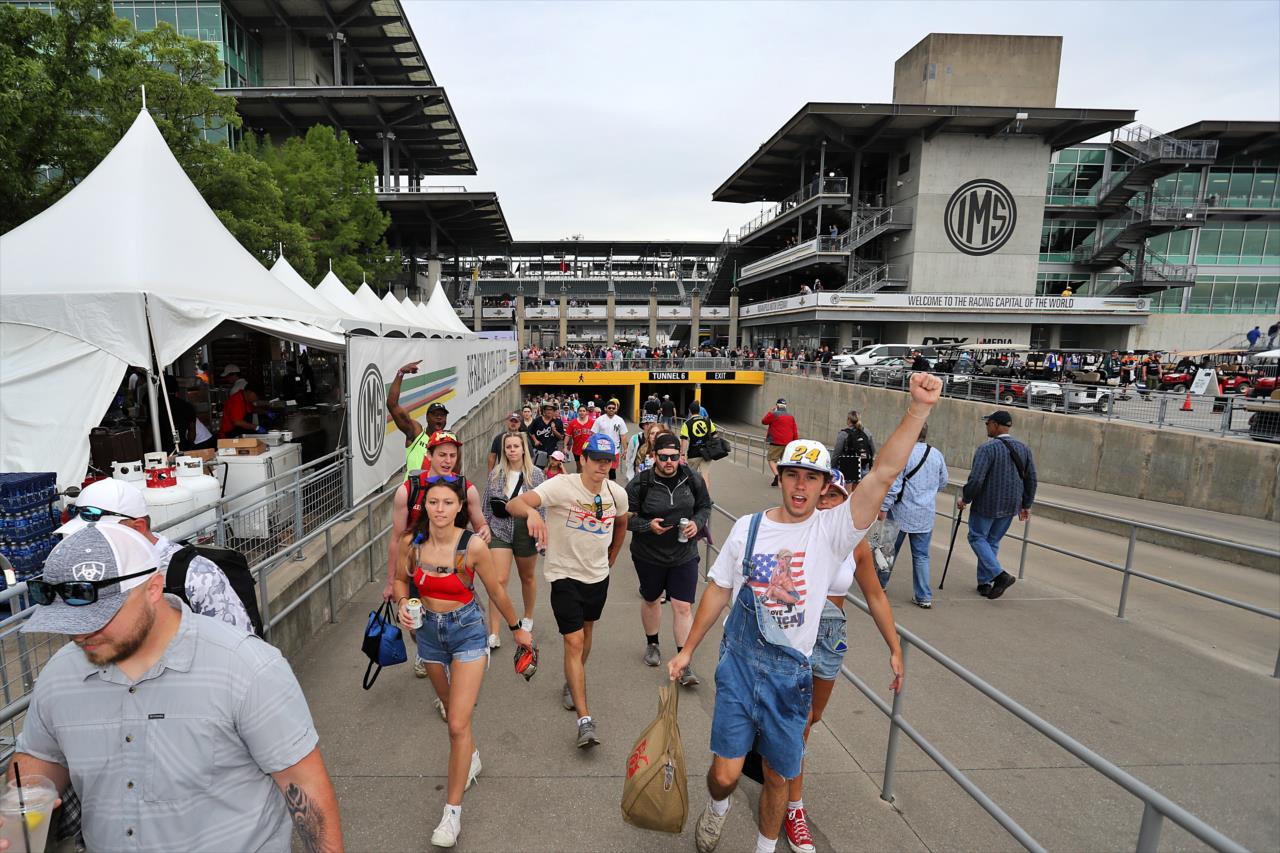 Fans pour into the infield - 107th Running of the Indianapolis 500 Presented By Gainbridge - By: Paul Hurley -- Photo by: Paul Hurley
