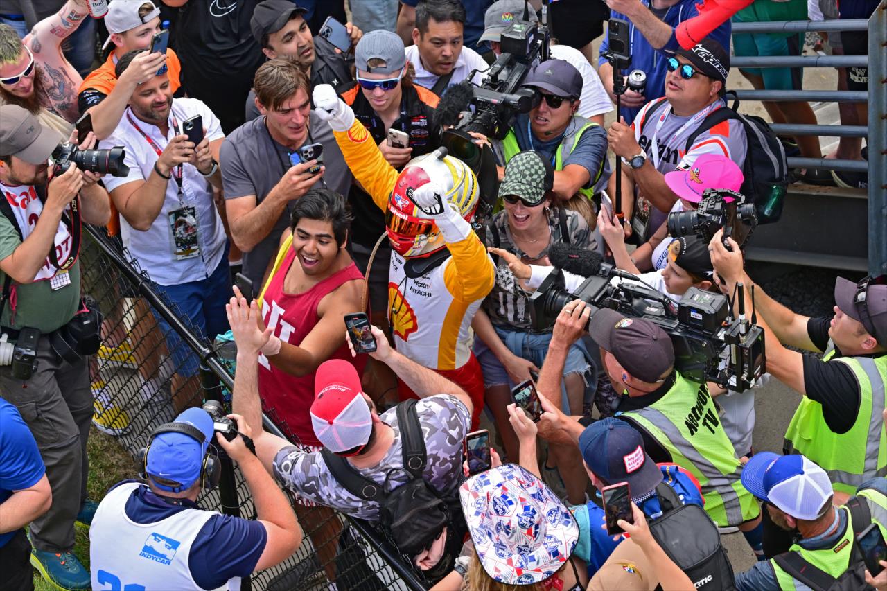 Josef Newgarden celebrates with the fans - 107th Running of the Indianapolis 500 Presented By Gainbridge - By: Walt Kuhn -- Photo by: Walt Kuhn