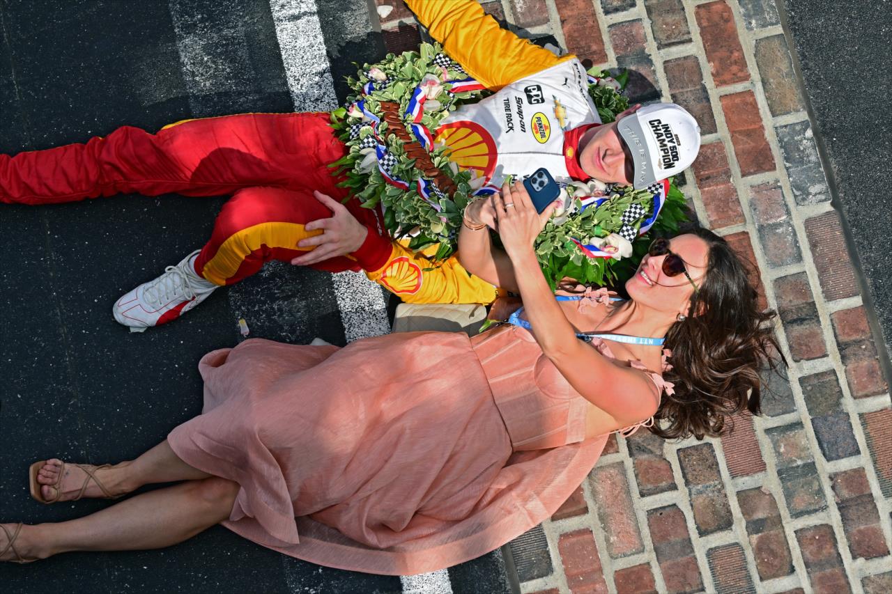 Josef Newgarden and wife, Ashley, with a selfie on the Yard of Bricks - 107th Running of the Indianapolis 500 Presented By Gainbridge - By: Walt Kuhn -- Photo by: Walt Kuhn