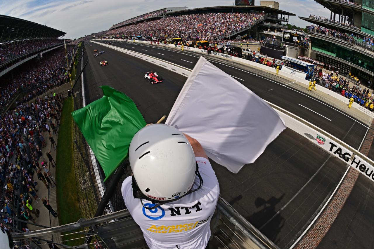 Green and White flags fly - 107th Running of the Indianapolis 500 Presented By Gainbridge - By: Walt Kuhn -- Photo by: Walt Kuhn