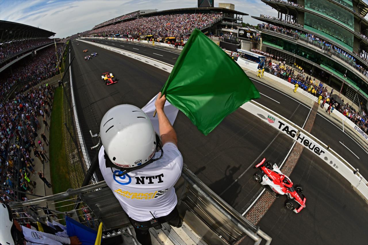 Green & White Flags fly - 107th Running of the Indianapolis 500 Presented By Gainbridge - By: Walt Kuhn -- Photo by: Walt Kuhn