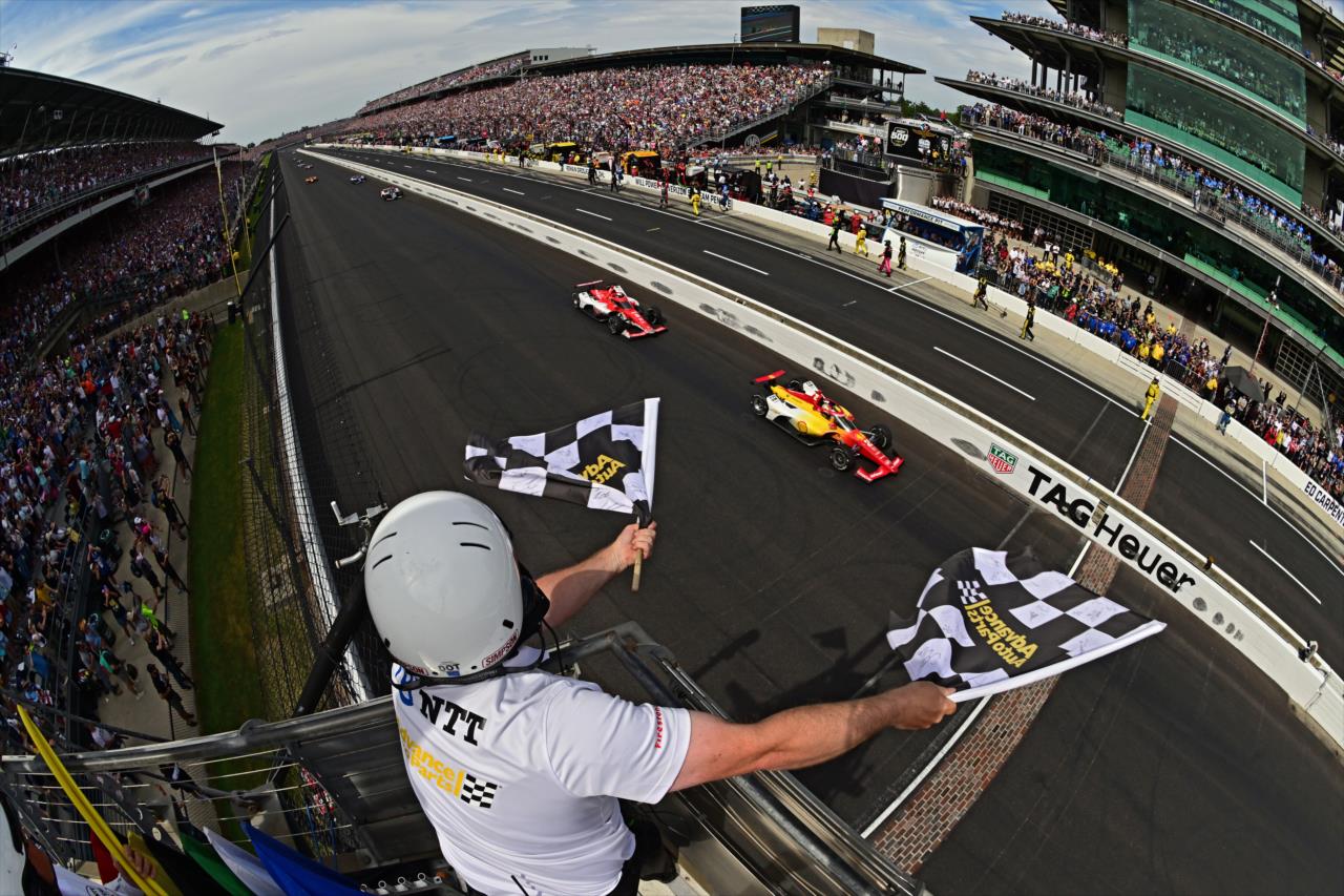 Twin checkered flags for Josef Newgarden - 107th Running of the Indianapolis 500 Presented By Gainbridge - By: Walt Kuhn -- Photo by: Walt Kuhn
