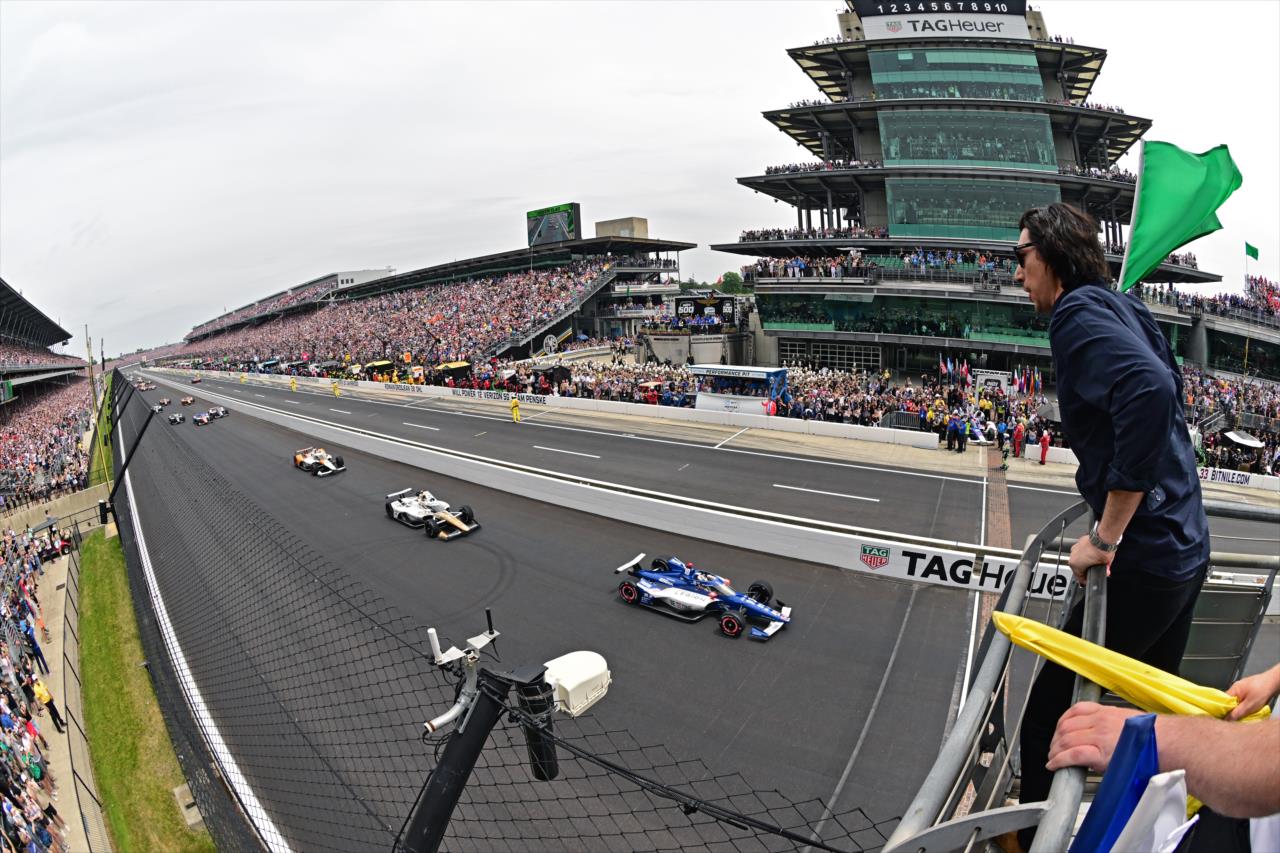 Adam Driver flies the green flag - 107th Running of the Indianapolis 500 Presented By Gainbridge - By: Walt Kuhn -- Photo by: Walt Kuhn