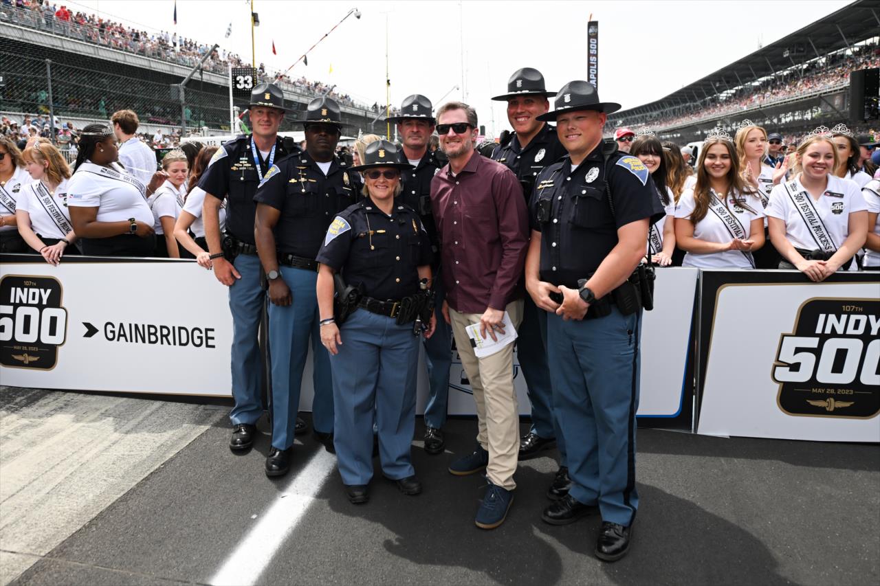 Dale Earnhardt Jr. with Indiana State Police trooper - 107th Running of the Indianapolis 500 Presented By Gainbridge - By: James Black -- Photo by: James  Black