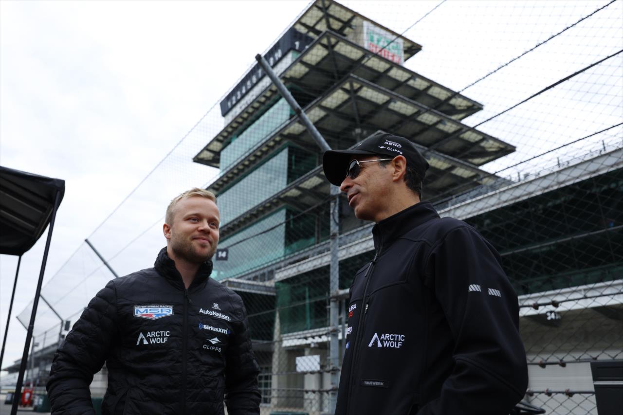 Felix Rosenqvist and Helio Castroneves - Indianapolis 500 ROP - By: Chris Jones -- Photo by: Chris Jones