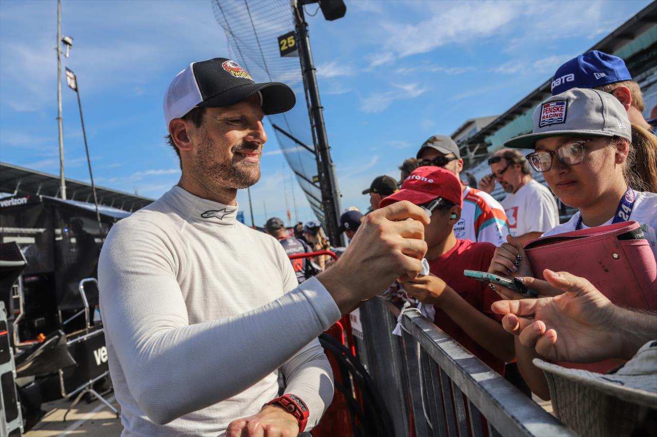 Romain Grosjean signs autographs before the start of the Big Machine Spiked Coolers Grand Prix on Saturday, Aug. 14 at IMS. -- Photo by: Aaron Skillman