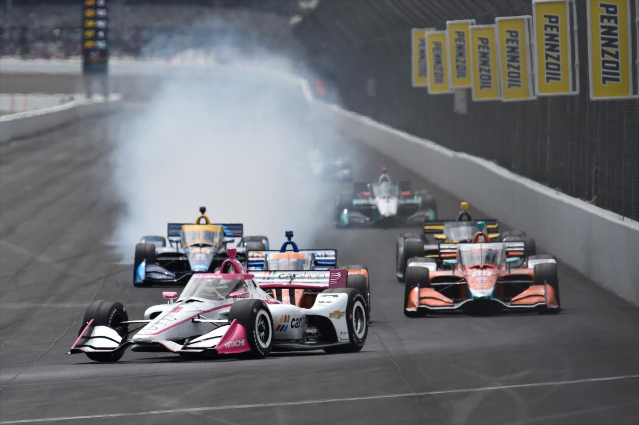 Jimmie Johnson locks up the brakes entering Turn 1 during the Big Machine Spiked Coolers Grand Prix at IMS on Saturday, Aug. 14. -- Photo by: Chris Owens