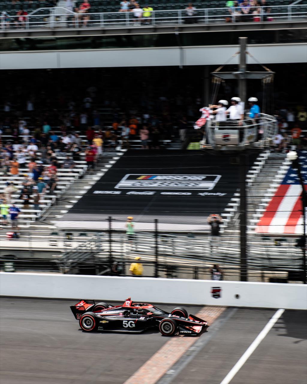 Will Power crosses the famed Yard of Bricks to win the Big Machine Spiked Coolers Grand Prix. It was his fifth win on the IMS road course and 40th career INDYCAR win. -- Photo by: Karl Zemlin