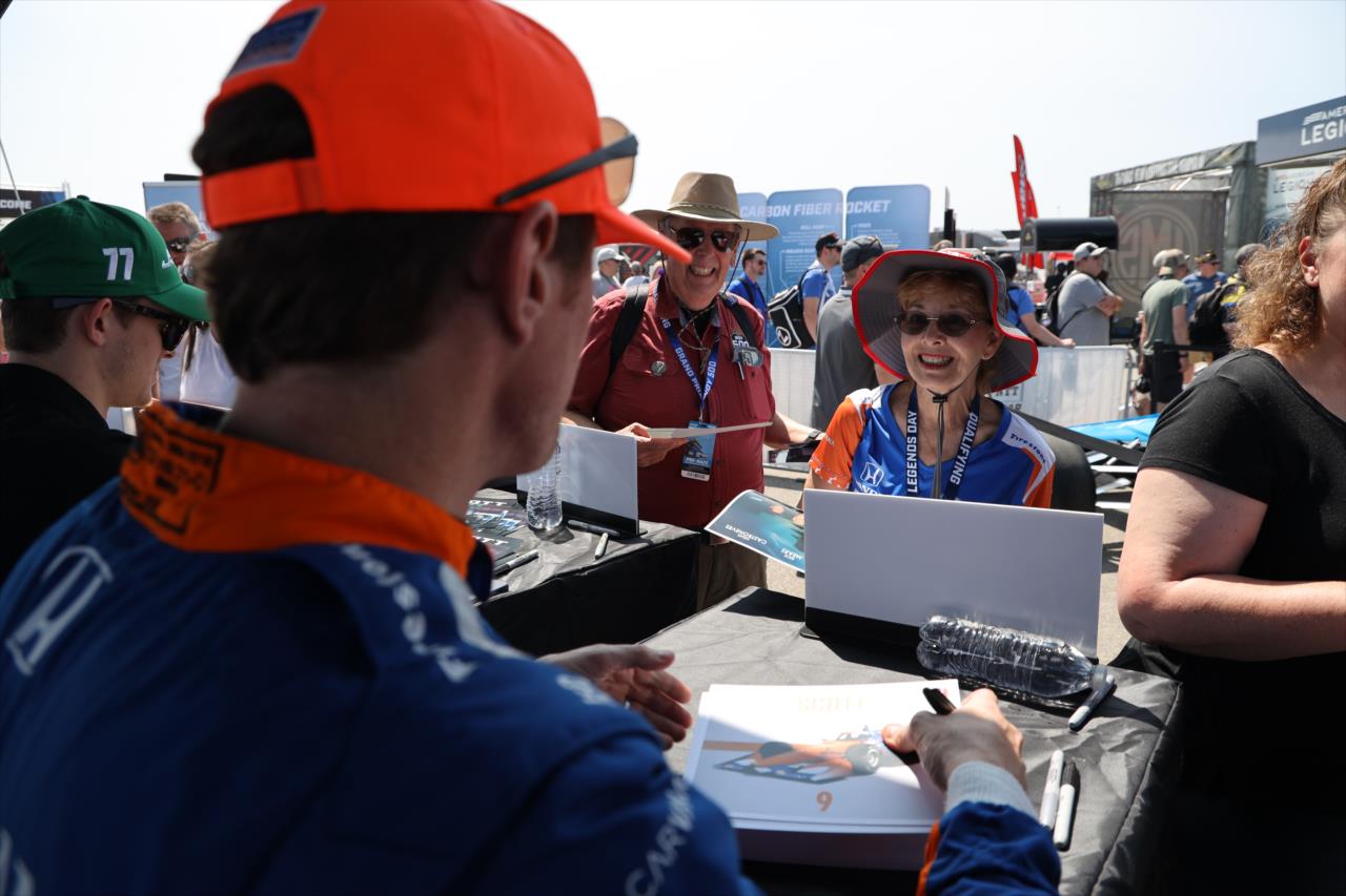Scott Dixon with fans - GMR Grand Prix - By: Joe Skibinski -- Photo by: Joe Skibinski