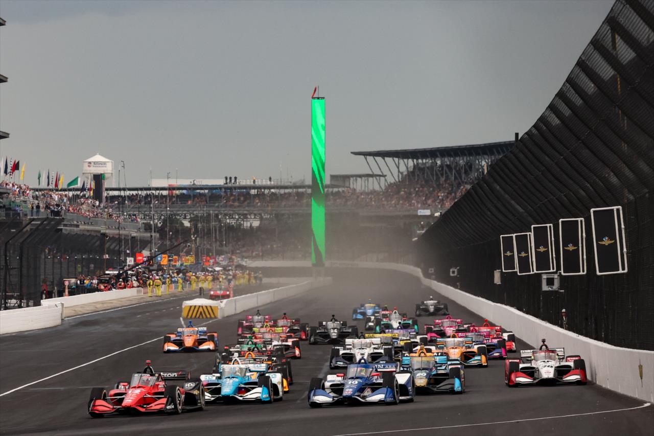 The field races into Turn 1 at the start of the 2022 GMR Grand Prix -- Photo by: Joe Skibinski