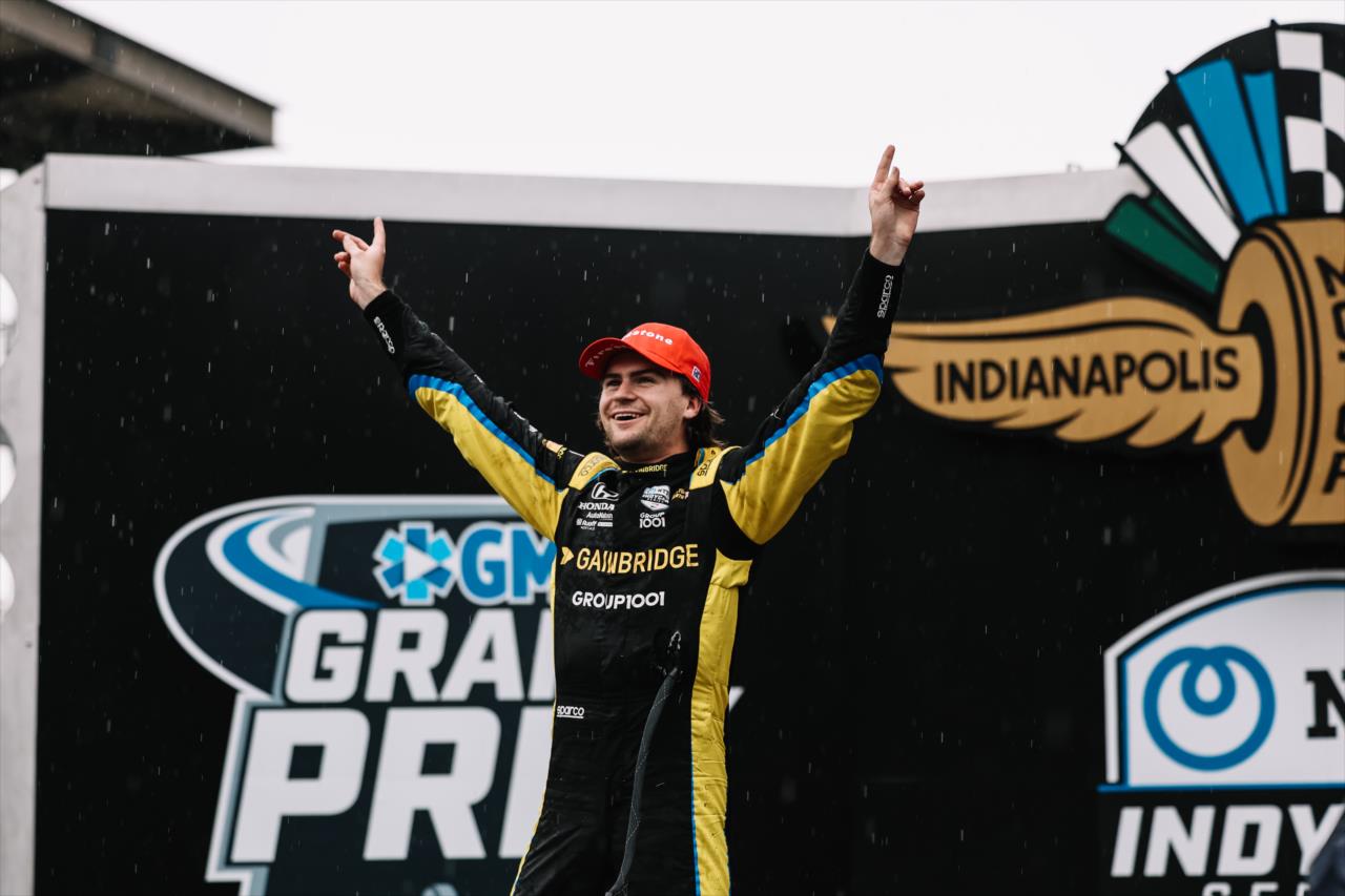 Colton Herta on the Victory Podium after winning the 2022 GMR Grand Prix at the Indianapolis Motor Speedway -- Photo by: Joe Skibinski