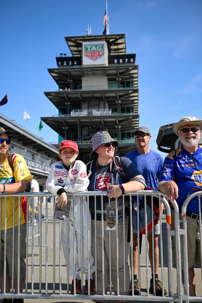 Fans watching the cars roll through Gasoline Alley - By: Karl Zemlin -- Photo by: Karl Zemlin