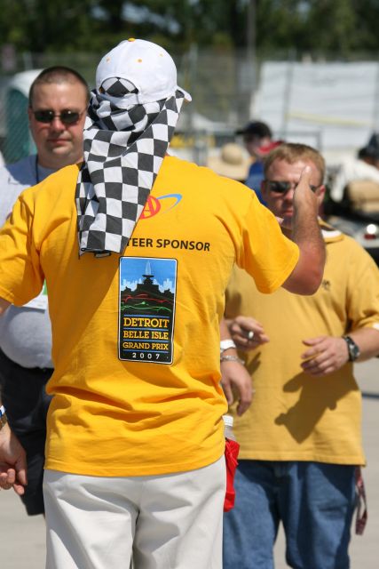 Volunteers help out during the Detroit Indy Grand Prix on Race day. -- Photo by: Chris Jones