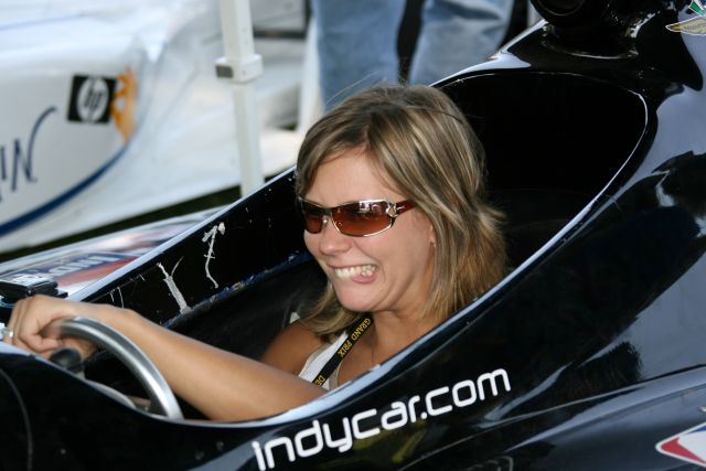 Fans enjoy the IndyCar Series simulators during the Detroit Indy Grand Prix on Race day. -- Photo by: Chris Jones