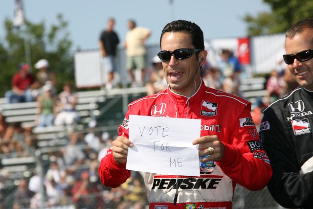 Helio Castroneves pushes for voted early on 'dancing with the stars' before the Detroit Indy Grand Prix on Race day. -- Photo by: Chris Jones
