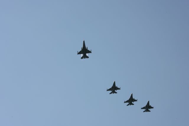 Fly-over of F16 fighter jets by the 127 FR, Selfridge Air National Guard during opening ceremonies. -- Photo by: Chris Jones