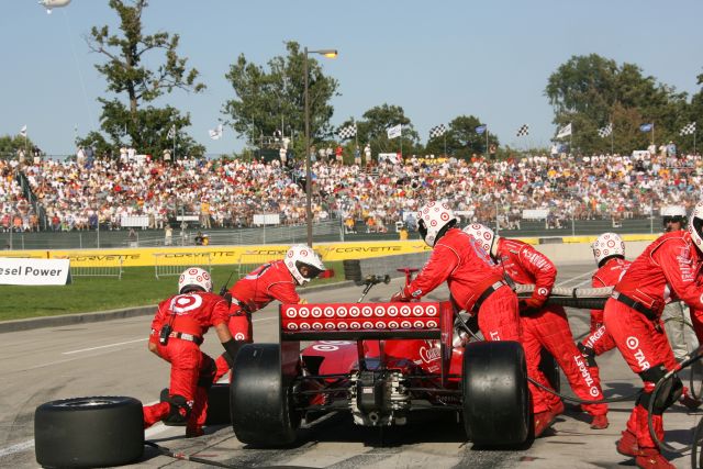Pit action from Target Chip Ganassi crew members as Dan Wheldon gets routine service. -- Photo by: Chris Jones