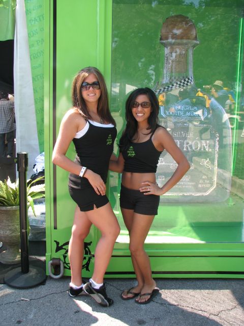 Fans pose in front of their favorite drivers area before the Detroit Indy Grand Prix on Race day. -- Photo by: Kate Belt