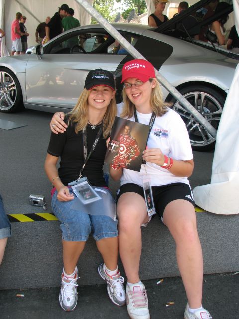 Young fans are all smiles after getting Dan Wheldon's autograph before the Detroit Indy Grand Prix on Race day. -- Photo by: Kate Belt